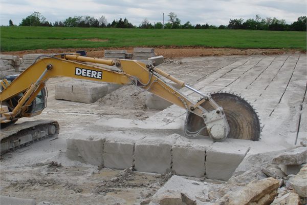 Excavator fitted with a Rock Tools Attachments tungsten rock saw